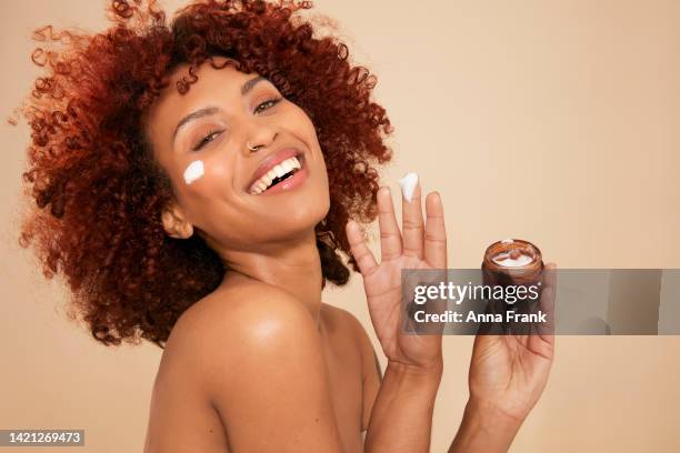 my skin is my temple - face cream stock pictures, royalty-free photos & images