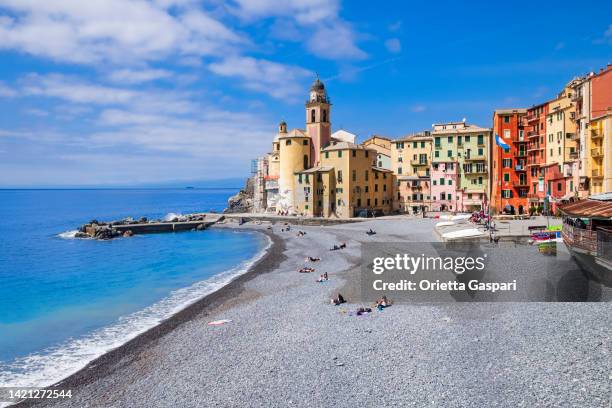 colorful buildings lined up on the camogli promenade - liguria, italy - camogli bildbanksfoton och bilder