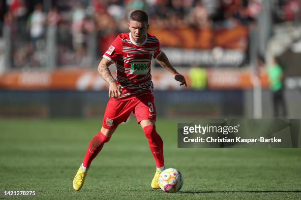 Mads Pedersen of FC Augsburg in action during the Bundesliga match between FC Augsburg and Hertha BSC at WWK-Arena on September 04, 2022 in Augsburg,...