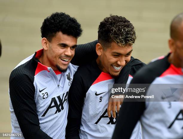 Roberto Firmino and Luis Diaz of Liverpool during a training session ahead of their UEFA Champions League group A match against SSC Napoli at AXA...