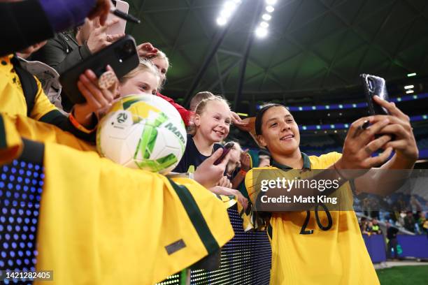 Sam Kerr of the Matildas interacts with fans after the International Friendly Match between the Australia Matildas and Canada at Allianz Stadium on...