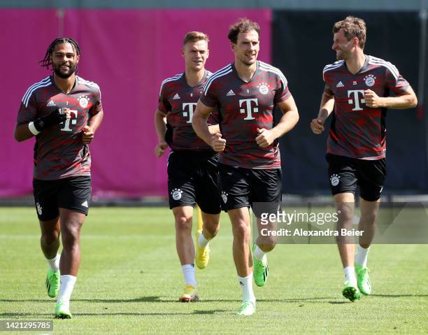 Serge Gnabry, Joshua Kimmich, Leon Goretzka and Thomas Mueller of FC Bayern Muenchen are pictured during a training session ahead of their UEFA...