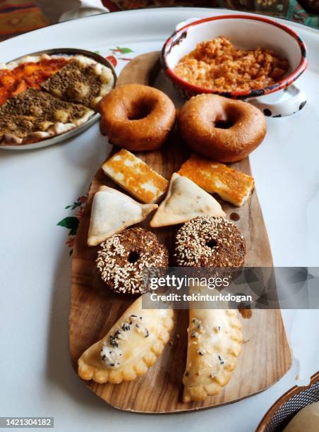 serving traditional middleeastern breakfast food at istanbul turkey - mat från mellanöstern bildbanksfoton och bilder