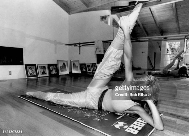 Actress Donna Mills as she performs exercises in her home dance studio, March 18, 1983 in Beverly Hills, California.