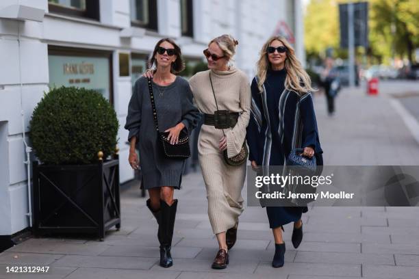 Katrin Lehbruner is seen wearing Isabel Marant black boots, ysl black bag, SoSue grey dress, Celine black shades and Kate Gelinsky is seen wearing a...