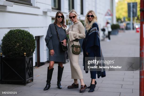 Katrin Lehbruner is seen wearing Isabel Marant black boots, ysl black bag, SoSue grey dress, Celine black shades and Kate Gelinsky is seen wearing a...