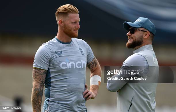 England captain Ben Stokes speaks with coach Brendon McCullum during a nets session at The Kia Oval on September 06, 2022 in London, England.