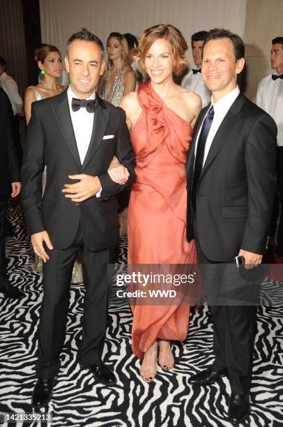 Francisco Costa, Hilary Swank and John Campisi attend the Metropolitan Museum of Art's 2009 Costume Institute gala. Swank wears Calvin Klein...