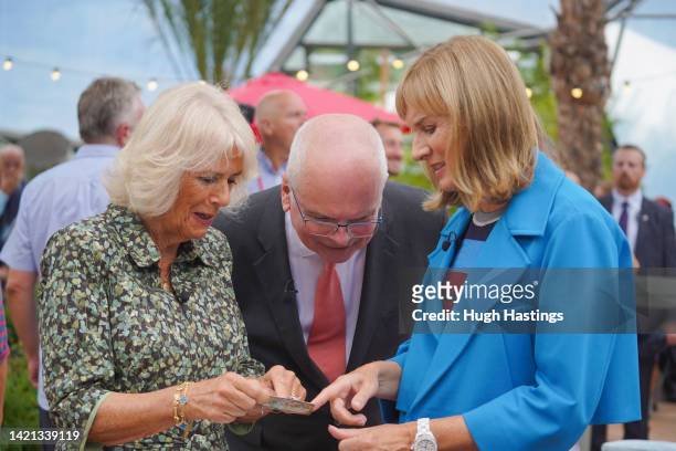 Camilla, Duchess of Cornwall with BBC presenter Fiona Bruce during her visit to the Antiques Roadshow at The Eden Project on September 06, 2022 in...