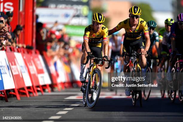 Primoz Roglic of Slovenia and Mike Teunissen of Netherlands and Team Jumbo - Visma cross the finish line during the 77th Tour of Spain 2022, Stage 16...