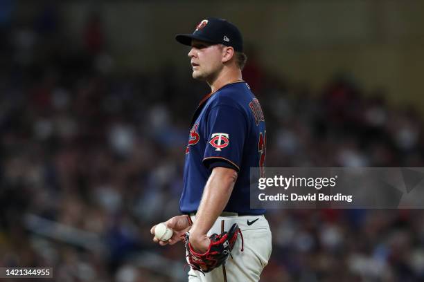 Tyler Duffey of the Minnesota Twins looks on after giving up a three-run home run to Vladimir Guerrero Jr. #27 of the Toronto Blue Jays in the eighth...