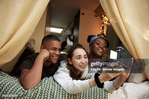 friends taking selfie in camper van - 3 guy friends road trip stock pictures, royalty-free photos & images