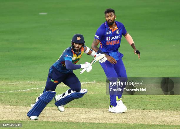 Hardik Pandya of India looks on as Kusal Mendis of Sri Lanka takes a run during the DP World Asia Cup match between India and Sri Lanka on September...