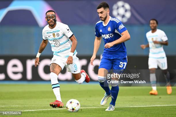 Pierre-Emerick Aubameyang of Chelsea looks on as Josip Sutalo of Dinamo Zagreb runs with the ball during the UEFA Champions League group E match...