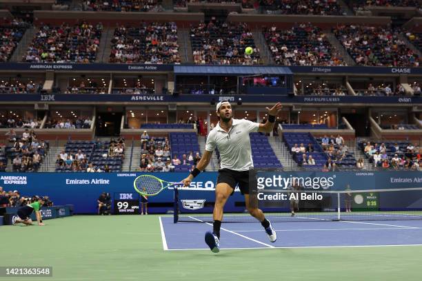 Matteo Berrettini of Italy returns a shot against Casper Ruud of Norway during their Men’s Singles Quarterfinal match on Day Nine of the 2022 US Open...