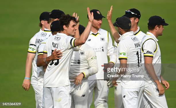 Tom Price of Gloucestershire celebrates the wicket of Lewis Gregory of Somerset during Day Two of the LV= Insurance County Championship match between...