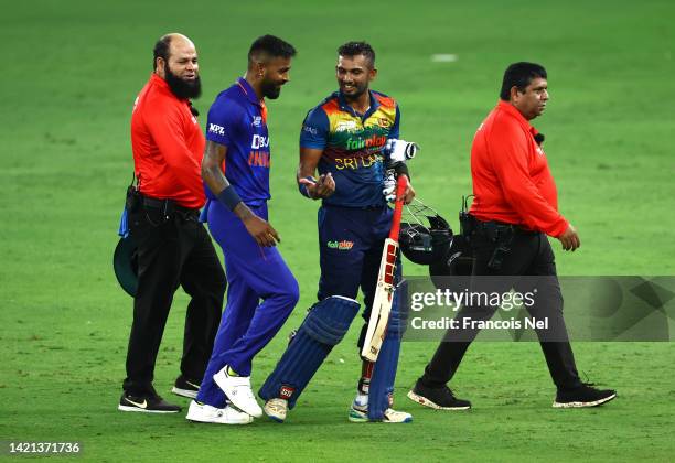 Dasun Shanaka of Sri Lanka speaks to Hardik Pandya of India after the DP World Asia Cup match between India and Sri Lanka on September 06, 2022 in...