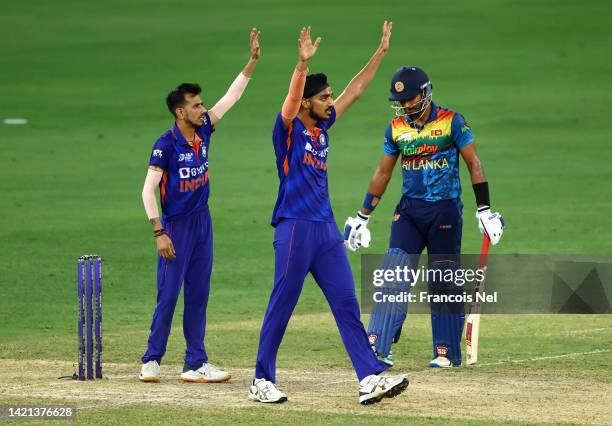 Arshdeep Singh of India and Yuzvendra Chahal of India reacts during the DP World Asia Cup match between India and Sri Lanka on September 06, 2022 in...