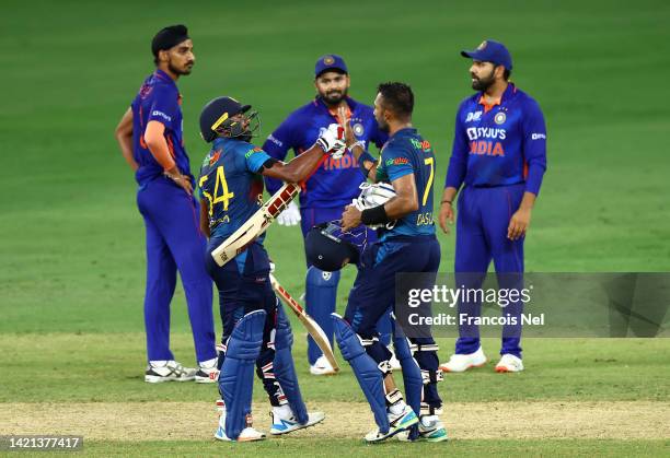 Dasun Shanaka of Sri Lanka and Bhanuka Rajapakse of Sri Lanka celebrates victory after the DP World Asia Cup match between India and Sri Lanka on...