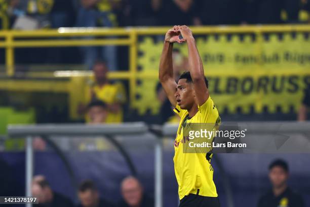 Jude Bellingham of Borussia Dortmund celebrates after scoring their team's third goal during the UEFA Champions League group G match between Borussia...