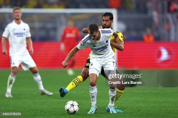 Viktor Claesson of FC Copenhagen is challenged by Emre Can of Borussia Dortmund during the UEFA Champions League group G match between Borussia...
