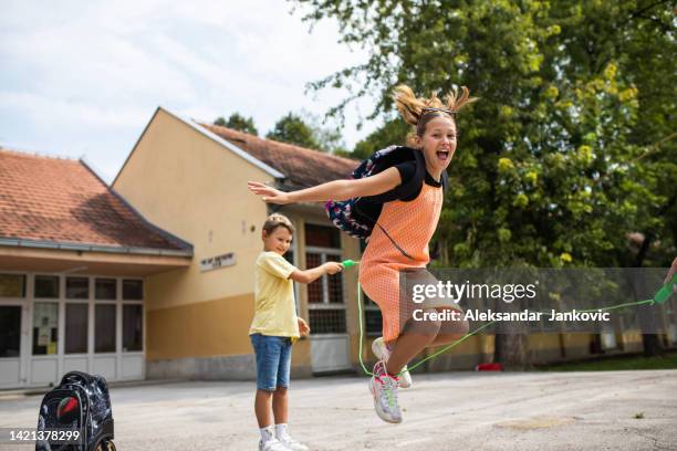 jump rope fun at recess - skipping rope stock pictures, royalty-free photos & images
