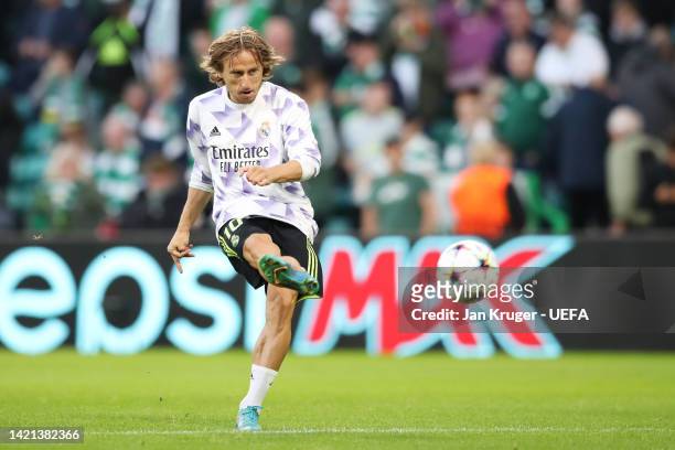 Luka Modric of Real Madrid warms up prior to the UEFA Champions League group F match between Celtic FC and Real Madrid at Celtic Park Stadium on...