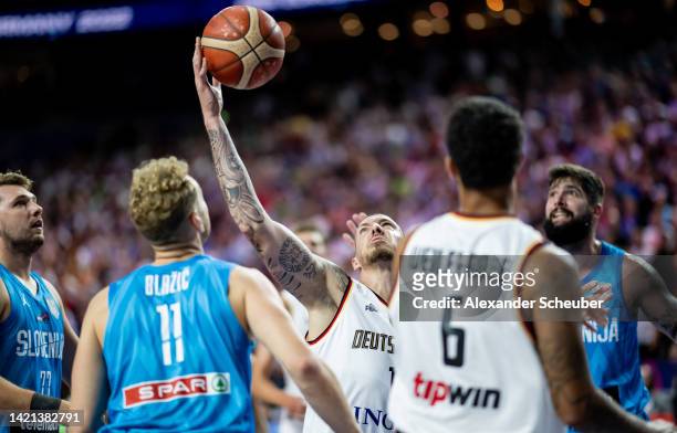 Daniel Theis of Germany in action during the FIBA EuroBasket 2022 group B match between Germany and Slovenia at Lanxess Arena on September 06, 2022...