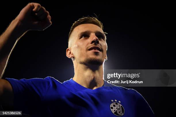 Mislav Orsic of Dinamo Zagreb celebrates with the fans after their sides victory during the UEFA Champions League group E match between Dinamo Zagreb...