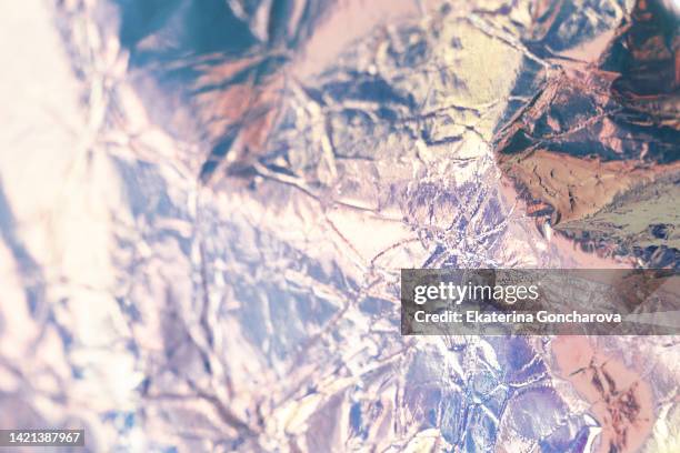 pink and gold abstract holographic background - gold foil texture stockfoto's en -beelden