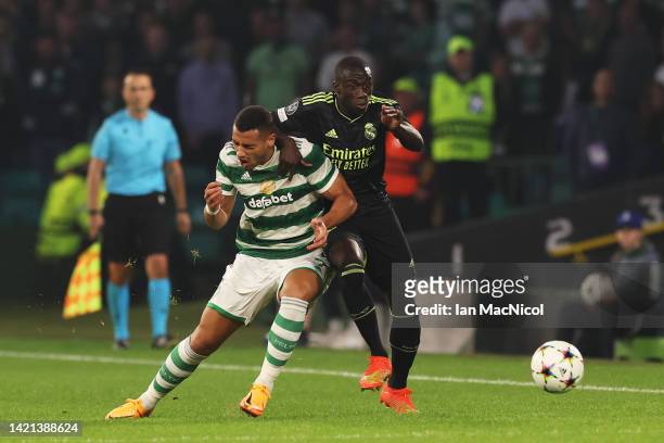 Giorgos Giakoumakis of Celtic battles for possession with Ferland Mendy of Real Madrid during the UEFA Champions League group F match between Celtic...