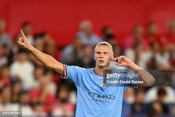 Erling Haaland of Manchester City celebrates after scoring their side's first goal during the UEFA Champions League group G match between Sevilla FC...