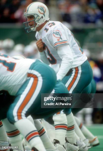 Quarterback Dan Marino of the Miami Dolphins calls a play in the game between the Miami Dolphins vs the New York Jets at The Meadowlands on November...