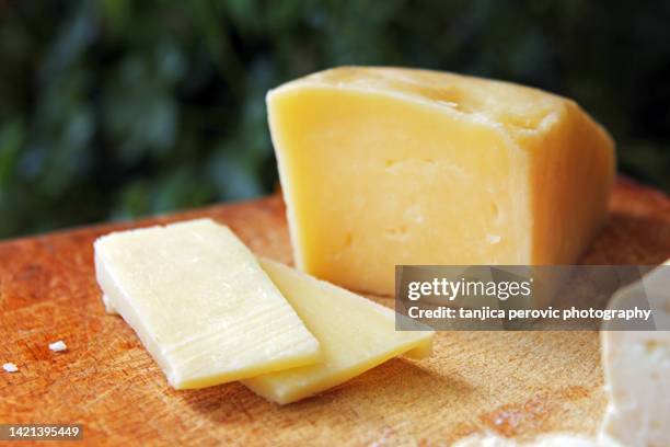 serbian hard yellow cheese - cheddar cheese stock pictures, royalty-free photos & images