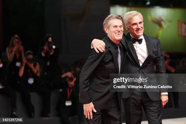 Willem Dafoe and Christoph Waltz attend the "Dead For A Dollar" red carpet at the 79th Venice International Film Festival on September 06, 2022 in...