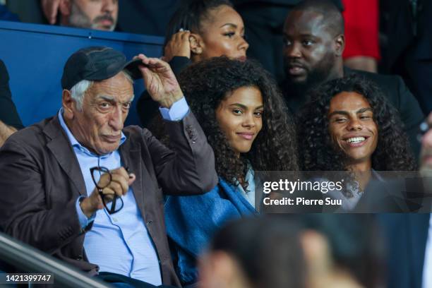 Gerard Darmon,Tina Kunakey and Zakari Kunakey attend the UEFA Champions League group H match between Paris Saint-Germain and Juventus at Parc des...