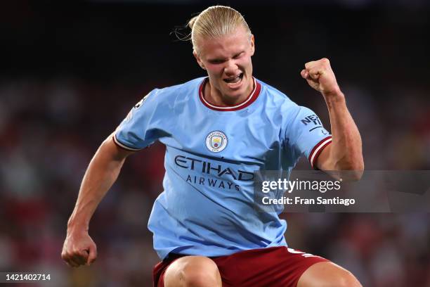 Erling Haaland of Manchester City celebrates after scoring their team's third goal during the UEFA Champions League group G match between Sevilla FC...