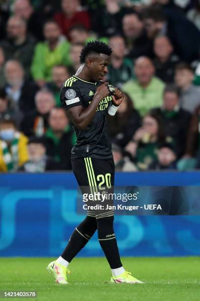 Vinicius Junior of Real Madrid celebrates after scoring their side's first goal during the UEFA Champions League group F match between Celtic FC and...