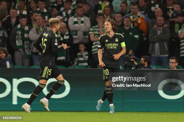 Luka Modric of Real Madrid celebrates with teammate Federico Valverde after scoring their team's second goal during the UEFA Champions League group F...