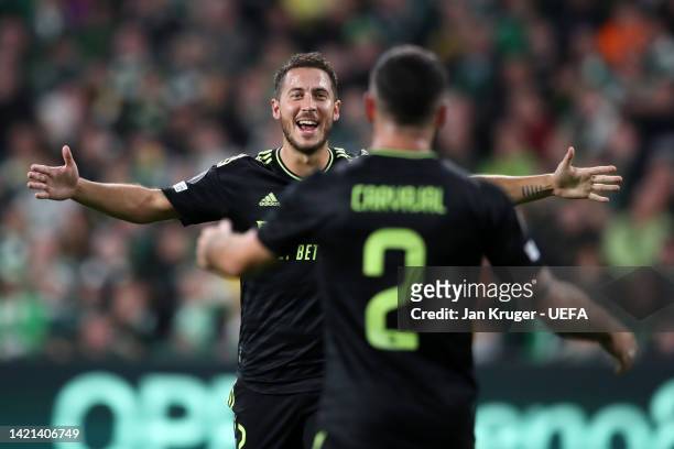 Eden Hazard of Real Madrid celebrates after scoring their side's third goal during the UEFA Champions League group F match between Celtic FC and Real...