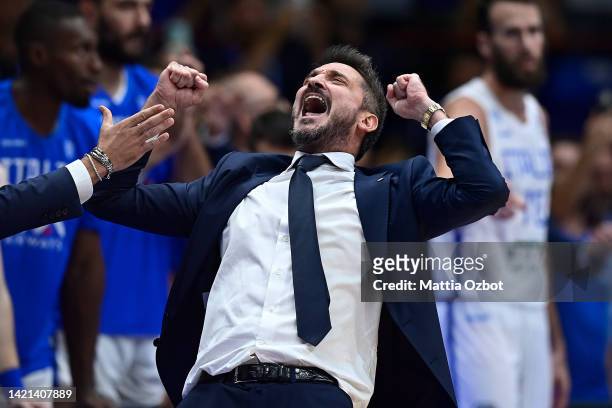 Coach Gianmarco Pozzecco of Italy celebrates victory during the FIBA EuroBasket 2022 group C match between Italy and Croatia at Forum di Assago on...