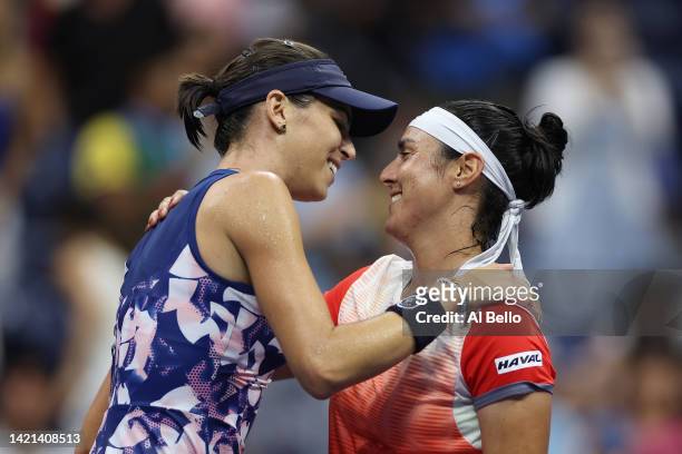 Ons Jabeur of Tunisia hugs Ajla Tomlijanovic of Australia after her win during their Women’s Singles Quarterfinal match on Day Nine of the 2022 US...