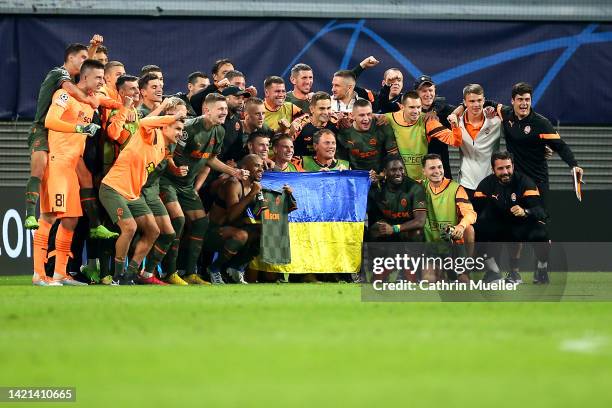 Shakhtar Donetsk pose for a team photo following their side's victory in the UEFA Champions League group F match between RB Leipzig and Shakhtar...