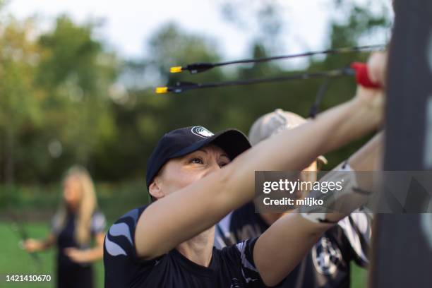 outdoors archery training - archery target stock pictures, royalty-free photos & images