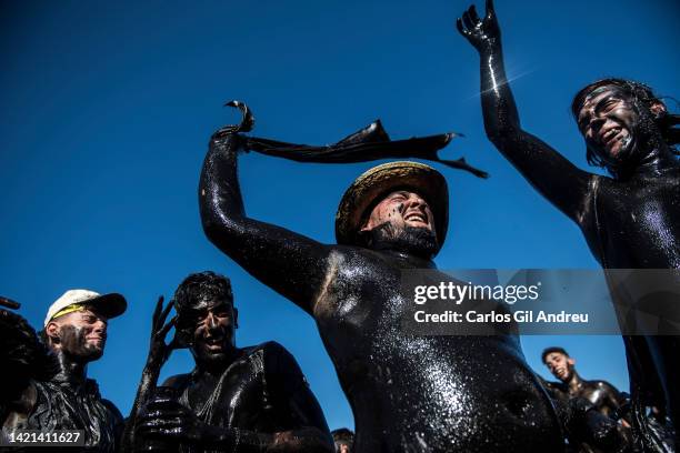 People covered in black grease take part in the festival of Cascamorras on September 06, 2022 in Baza, Spain. After two years of hiatus due to the...