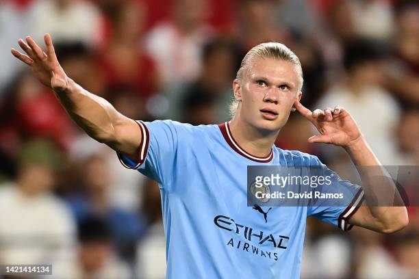 Erling Haaland of Manchester City FC celebrates after scoring his team's first goal during the UEFA Champions League group G match between Sevilla FC...