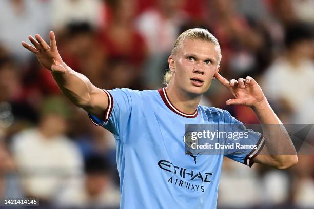 Erling Haaland of Manchester City FC celebrates after scoring his team's first goal during the UEFA Champions League group G match between Sevilla FC...