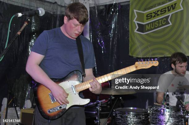 Adam Thompson and Darren Lackie of We Were Promised Jetpacks perform on stage at Showcasing Scotland, Easy Tiger Patio during SXSW 2012 Music...