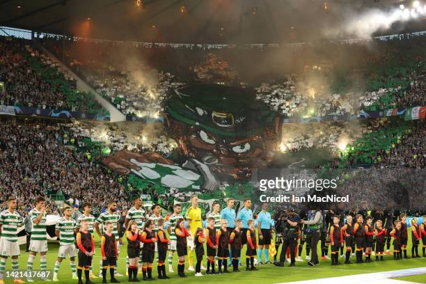 Celtic and Real Madrid line up during the UEFA Champions League group F match between Celtic FC and Real Madrid at Celtic Park on September 06, 2022...