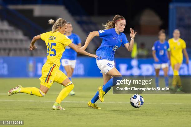 Benedetta Glionna of Italy competes for the ball with Brigita Goder of Romania during the FIFA Women's World Cup 2023 Qualifier group G match between...